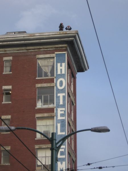 Filming crew shoots rally against police brutality from atop the Empress Hotel