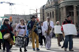 DTES Residents march through streets and paint the site of future Aboriginal Healing and Wellness Centre 