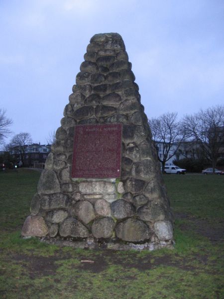 A stone cairn and Parks Canada plaque in Marpole Park marks the Marpole Midden National Historic Site of Canada in Vancouver. Photo: Sandra Cuffe