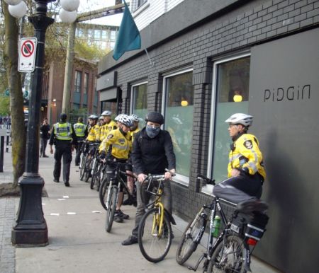 Cops line up to protect Pidgin restaurant.