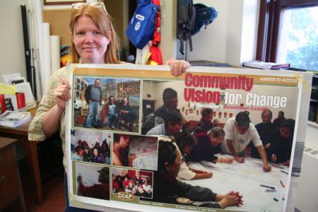 Wendy Pedersen gives the VMC exclusive access to her office & she holds up the "vision poster"