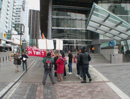 Protestors with Banners and Signs Outside the Convention Centre