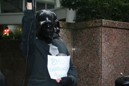 "BMO shareholder Vader" makes a surprise appearance at the rally outside the Four Seasons hotel. Vancouver, March 22, 2011. Photo: Sandra Cuffe