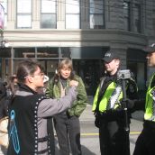 Explaining to two young officers the role of police in gang rapes
