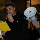 SFU English Dept. prof Steve Collis reads one of his open poems to Goldcorp