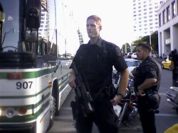 suddenly an ERT cop brought this big gun out and handed it to this tall guy