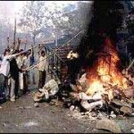 Genocidal mobs burning-muslim homes in Gujarat, all under the eye of Narindra Modi the chief executive of the state.