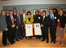 Amy Larkin from Greenpeace with reps from Coca-Cola, PepsiCo, McDonald’s, Unilever, and the UNEP receive an award at Harvard, May 2011